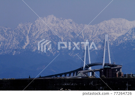 Tateyama mountain range and Shinminato Bridge 77264726
