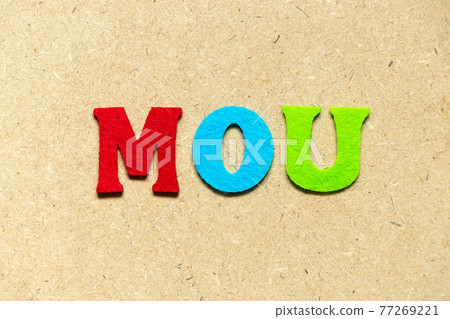 Color cloth alphabet letter in word MOU (Abbreviation of memorandum of understanding) on wood background Color cloth alphabet letter in word MOU (Abbreviation of memorandum of understanding) on wood background 77269221