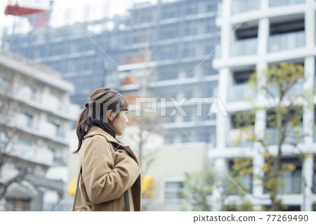 Woman in coat Woman in coat 77269490