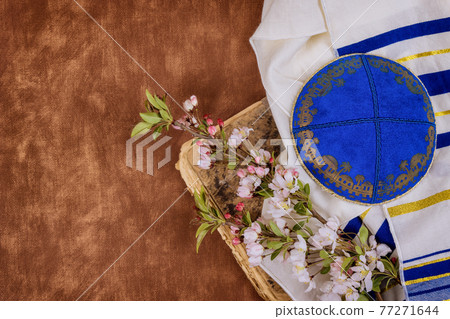 Prayer torah book with prayer shawl tallit jewish religious symbols Prayer torah book with prayer shawl tallit jewish religious symbols 77271644