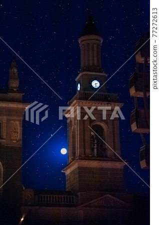 The bell tower of the Church of St. Catherine (Greek Monastery) at night in the light of the moon and stars. Contract Square, Kyiv Ukraine 77272613