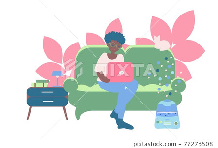 Freelancer working at home Young african american women seat on sofa with note book and humidifier near nightstand Freelancer working at home Young african american women seat on sofa with note book and humidifier near nightstand 77273508