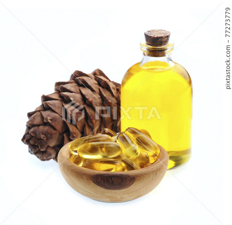 Pine oil with pine pile on white backgrounds. 77273779