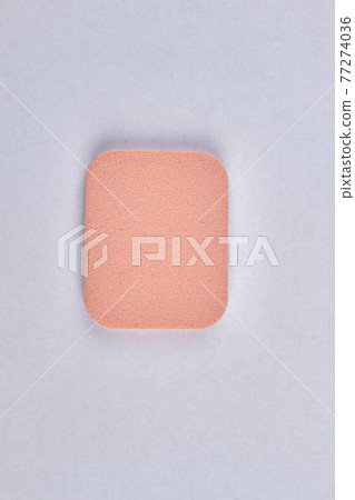 Top view of face powder sponge isolated on white background. 77274036