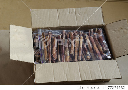 Popular natural dried treats for pets. Dried bovine penis for dogs. 77274382