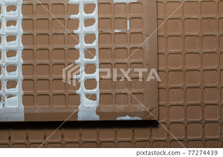 Backside of ceramic tiles with white engobe paste. 77274439