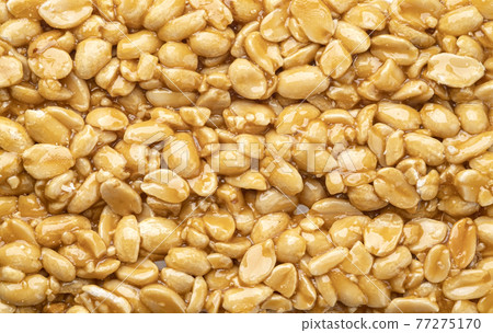 Peanut kozinaki texture, close up Peanut kozinaki texture, close up 77275170