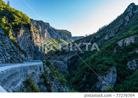 Mountain view near the village Ubraye at Lake Serre-Poncon in France near Gap. 77276764