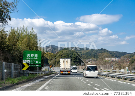 A truck running at the exit of the Mine Nishi Interchange in Mine City, Yamaguchi Prefecture 77281394