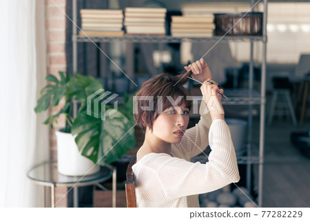 Genderless LGBT girl like a boy, a woman who cuts her hair 77282229