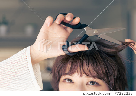 Genderless LGBT girl like a boy, a woman who cuts her hair 77282233