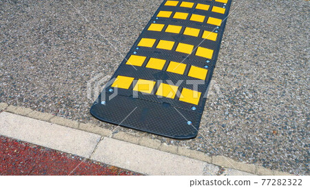 Road reflector installed at the top of the slope on the bank 77282322