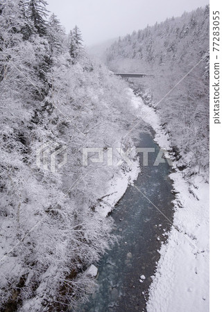 Biei River and spring snow Biei River and spring snow 77283055