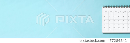 Calendar and copy space on light blue background 77284841
