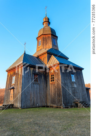 Wooden 18th century church of St. Nicholas in authentic Cossack farm in Stetsivka village in Cherkasy region, Ukraine Wooden 18th century church of St. Nicholas in authentic Cossack farm in Stetsivka village in Cherkasy region, Ukraine 77285366