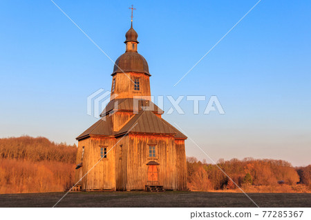 Wooden 18th century church of St. Nicholas in authentic Cossack farm in Stetsivka village in Cherkasy region, Ukraine Wooden 18th century church of St. Nicholas in authentic Cossack farm in Stetsivka village in Cherkasy region, Ukraine 77285367