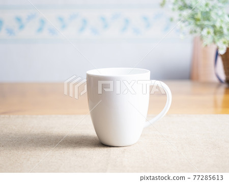 A mug on the table A mug on the table 77285613