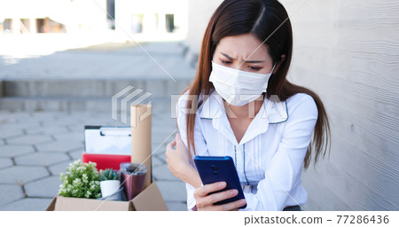 Asian woman being fired 77286436