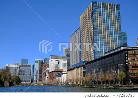 Imperial Palace moat and skyscrapers 77286783