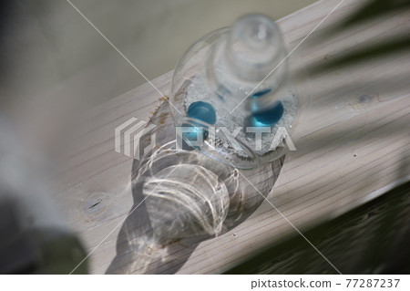 Reflection of a vial Reflection of a vial 77287237