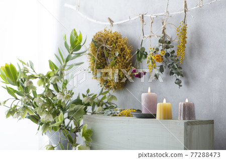 Christmas roses and candles dried flowers Christmas roses and candles dried flowers 77288473