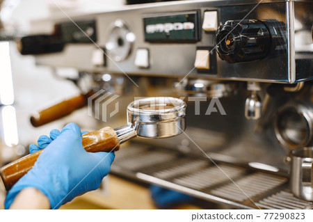 Ground coffee in a holder for making coffee Ground coffee in a holder for making coffee 77290823