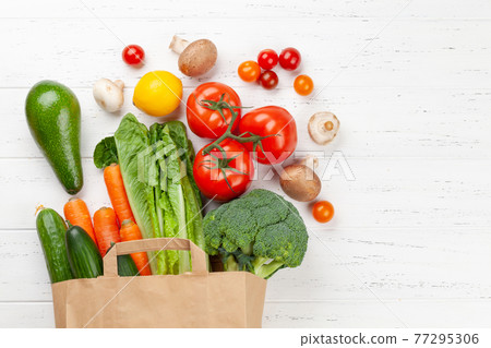 Different food in recycling paper bag Different food in recycling paper bag 77295306