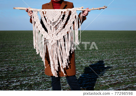creation of a panel from macrame 77298598