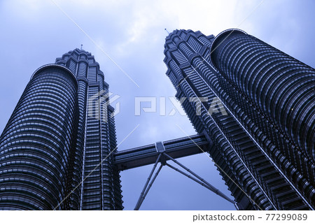 View of The Petronas Twin Towers in Kuala Lumpur, Malaysia. 77299089