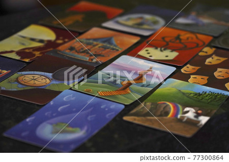 Defocused assortment of game cards Dixit Defocused assortment of game cards Dixit 77300864