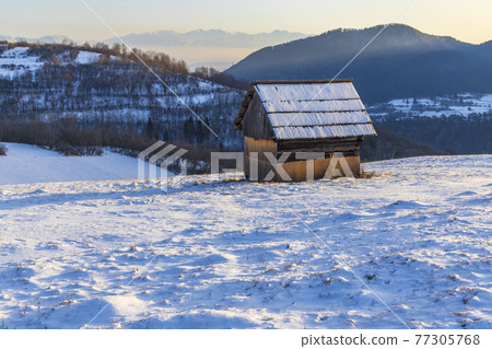 Winter landscape with hayloft in Velka Fatra, Slovakia Winter landscape with hayloft in Velka Fatra, Slovakia 77305768