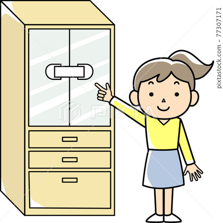 A cupboard with a stopper on the door and a woman 77307171