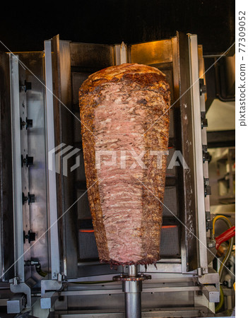 Traditional Turkish Doner Kebab kebab on skewer. Turkish cuisine street food 77309052