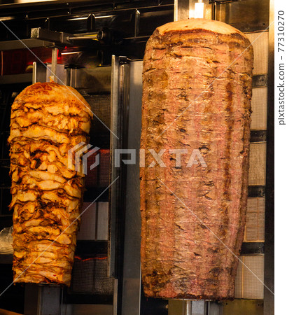Traditional Turkish Doner Kebab kebab on skewer. Turkish cuisine street food 77310270