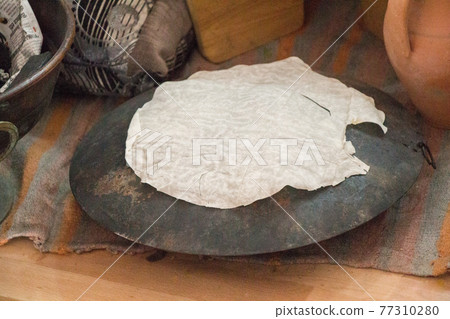 Making of traditional turkish gozleme pancake 77310280