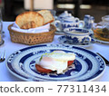 Theme about having eggs for breakfast. 77311434