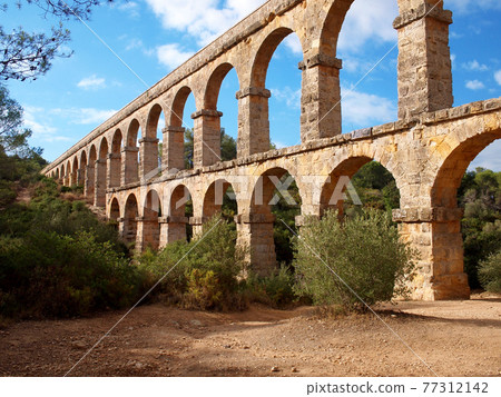 Roman Aqueduct Ruins near Tarragona, Spain Devil's Bridge Roman Aqueduct Ruins near Tarragona, Spain Devil's Bridge 77312142