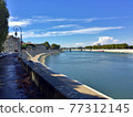 The magnificent Rhone river in Arles, France 77312145