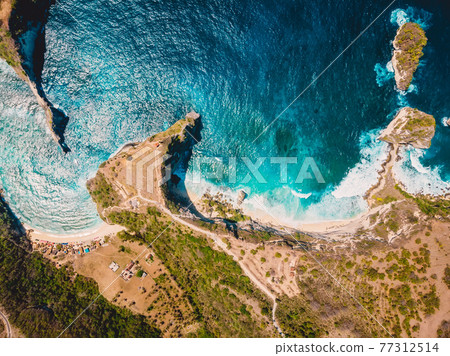 Aerial view of beach with blue ocean in Nusa Penida. Drone view 77312514