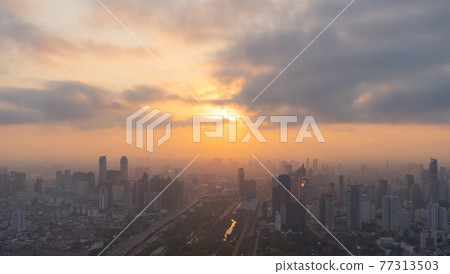 Aerial view of Bangkok Downtown Skyline, Thailand. Financial district and business centers in smart urban city in Asia. Skyscraper and high-rise buildings at sunset. 77313503