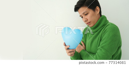 Asian ethnic LGBT tomboy sad expression disappointed in love and relationship Asian ethnic LGBT tomboy sad expression disappointed in love and relationship 77314081