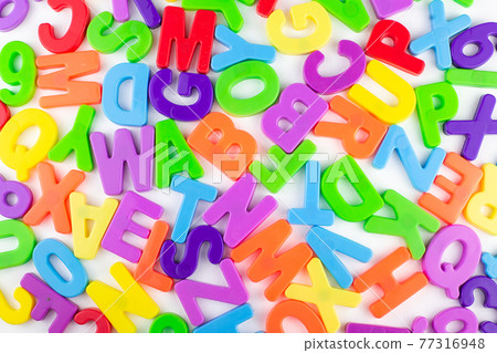 colorful letters are randomly scattered on a white background colorful letters are randomly scattered on a white background 77316948