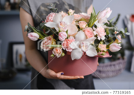 Wedding flowers, bridal bouquet closeup. Decoration made of roses, peonies and decorative plants, close-up, selective focus, nobody, objects Wedding flowers, bridal bouquet closeup. Decoration made of roses, peonies and decorative plants, close-up, selective focus, nobody, objects 77319165