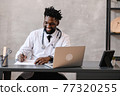 telehealth with virtual doctor appointment and online therapy session. Black doctor online conference  77320255