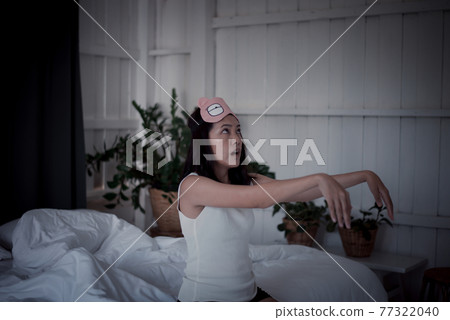 Woman sleepwalker with somnambulism sleep and walking in bedroom Woman sleepwalker with somnambulism sleep and walking in bedroom 77322040