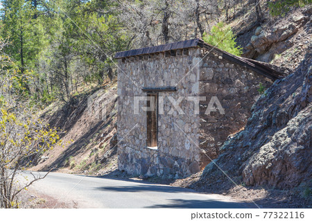 Rundown, rock built cabin, in Mogollon Ghost Town. Mogollon Historic District is a wildest mining town in Mogollon, Catron County, New Mexico 77322116