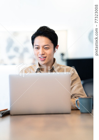 Men having an online meeting with remote work 77323008