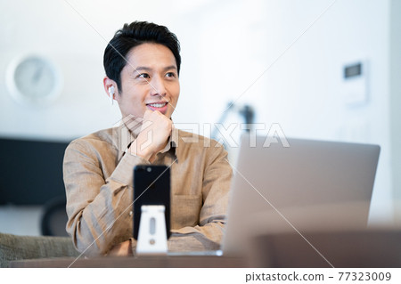 Men having an online meeting with remote work 77323009