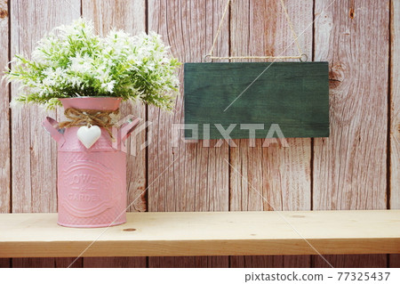 Empty wooden board hanging on wooden background Empty wooden board hanging on wooden background 77325437