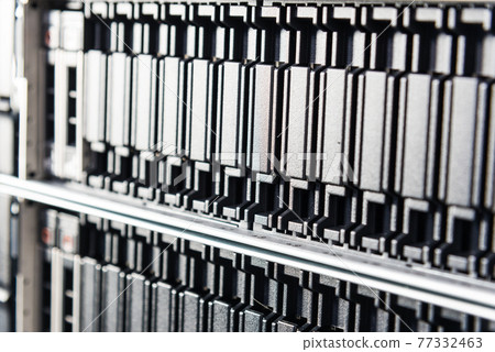 cluster of data storage SSD hard drives inside server rack cluster of data storage SSD hard drives inside server rack 77332463
